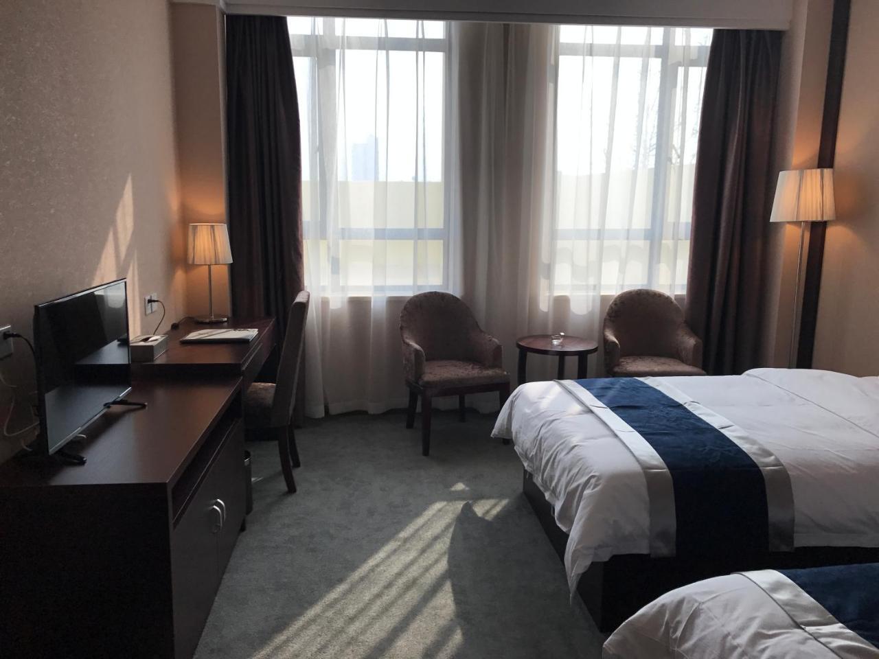 Hubei Airport Business Hotel Tianhe Airport Branch Ухань Экстерьер фото